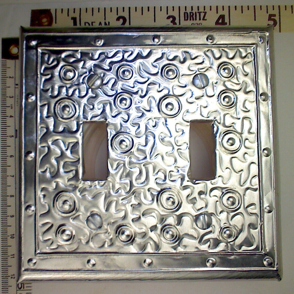Aluminum Covered Plastic Double Toggle Wallplate by Metalyglass in Puerto Rico