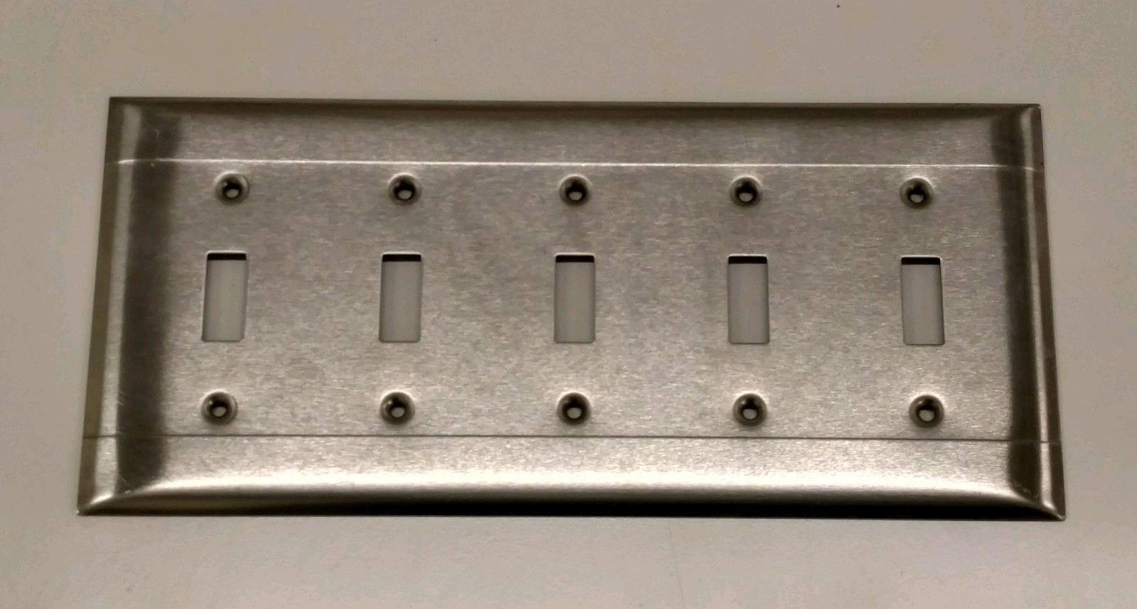 Stainless steel wall plate – 5 gang toggle