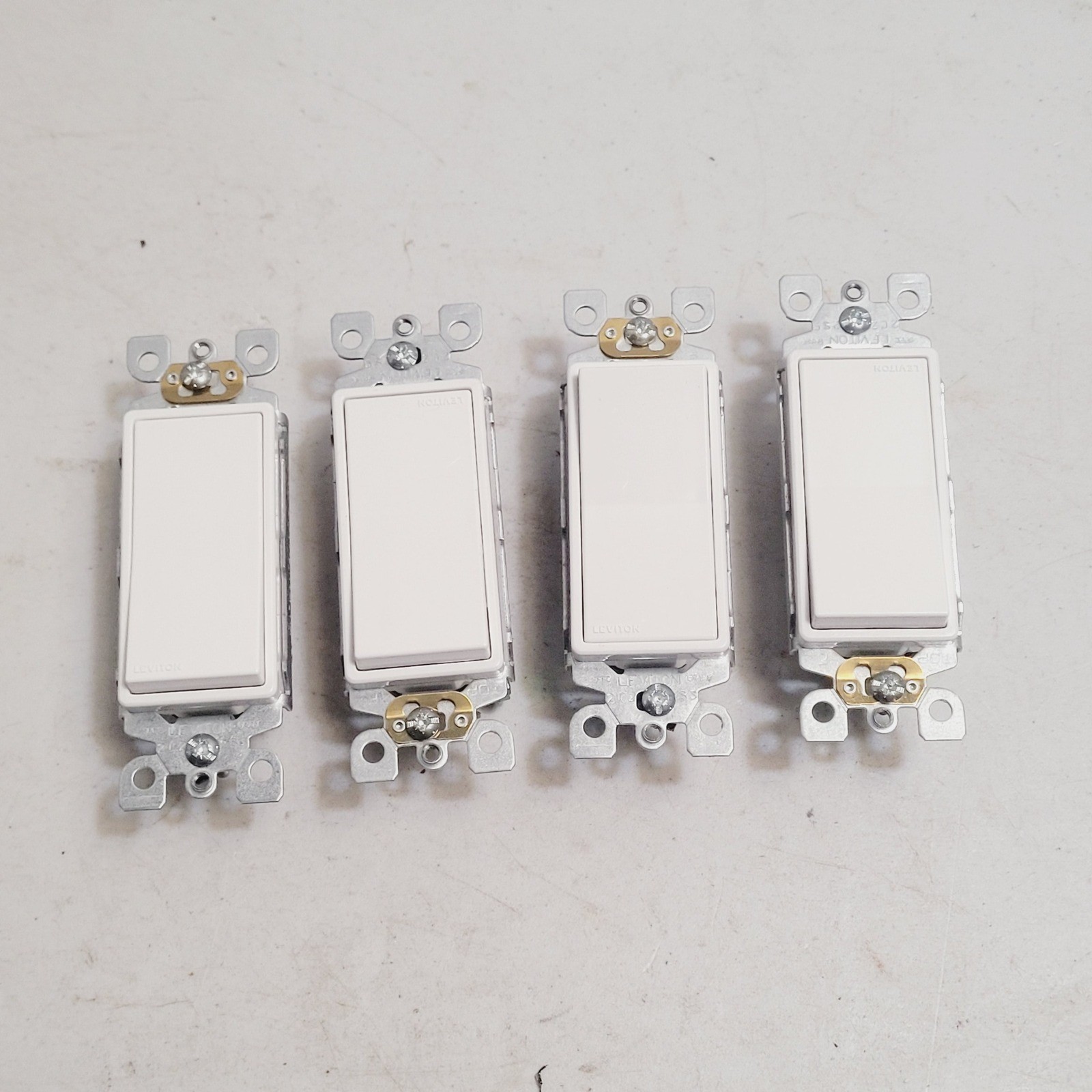 Lot of 4 Leviton 5601-5AW Decora Rocker Light Switch White 15A 120/277V