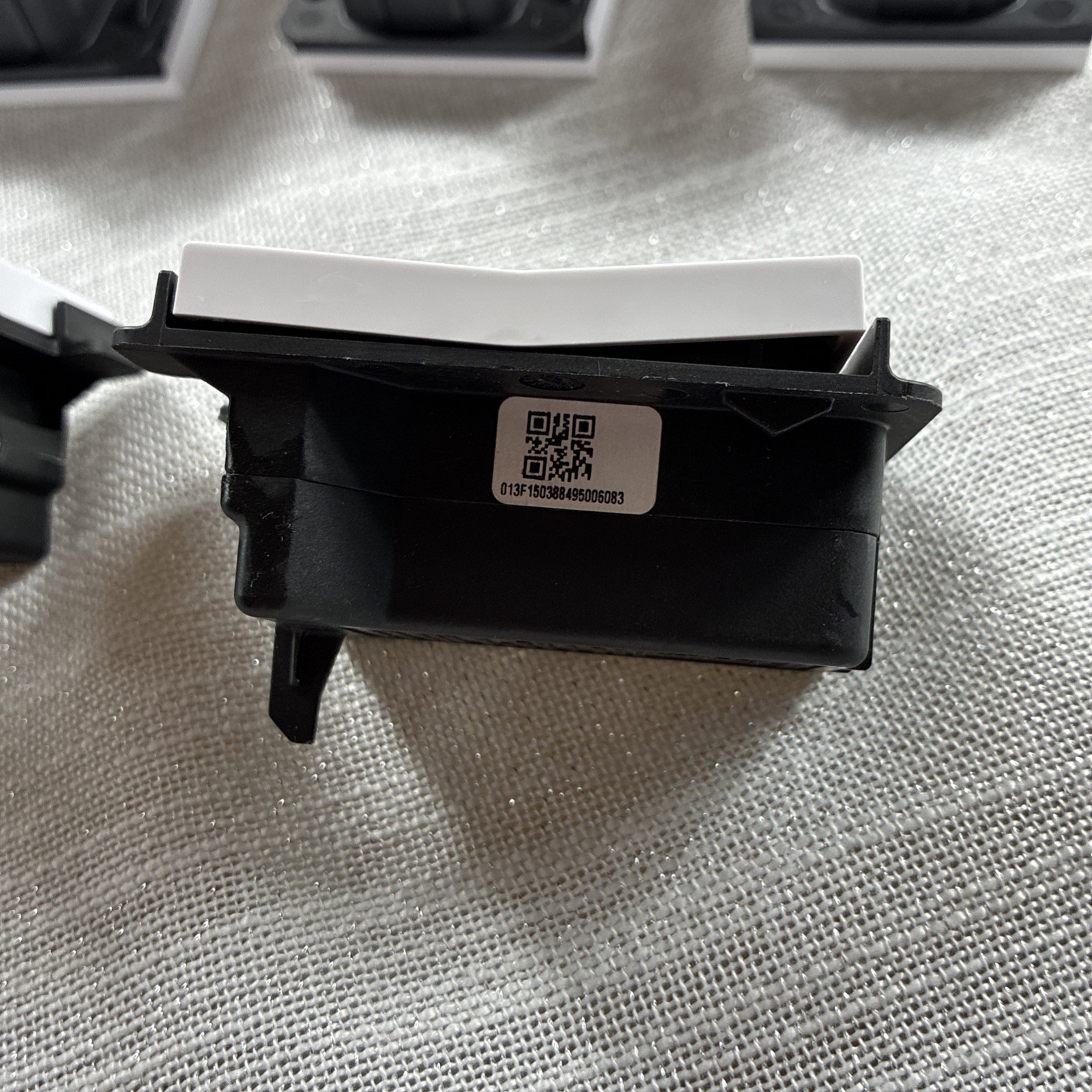 Deako Simple Snap Light 5 Switches in white. These are standard on/off switches
