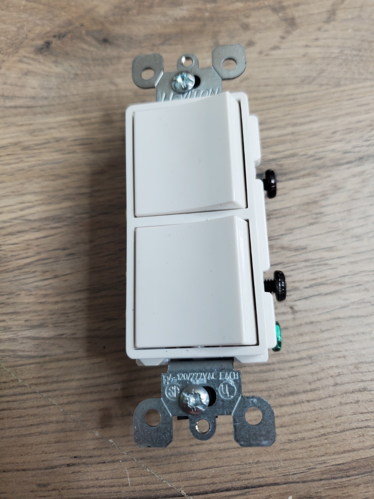5643-W Leviton-White-Decora-Rocker-Combination-Two-switches 3-way, side wired.