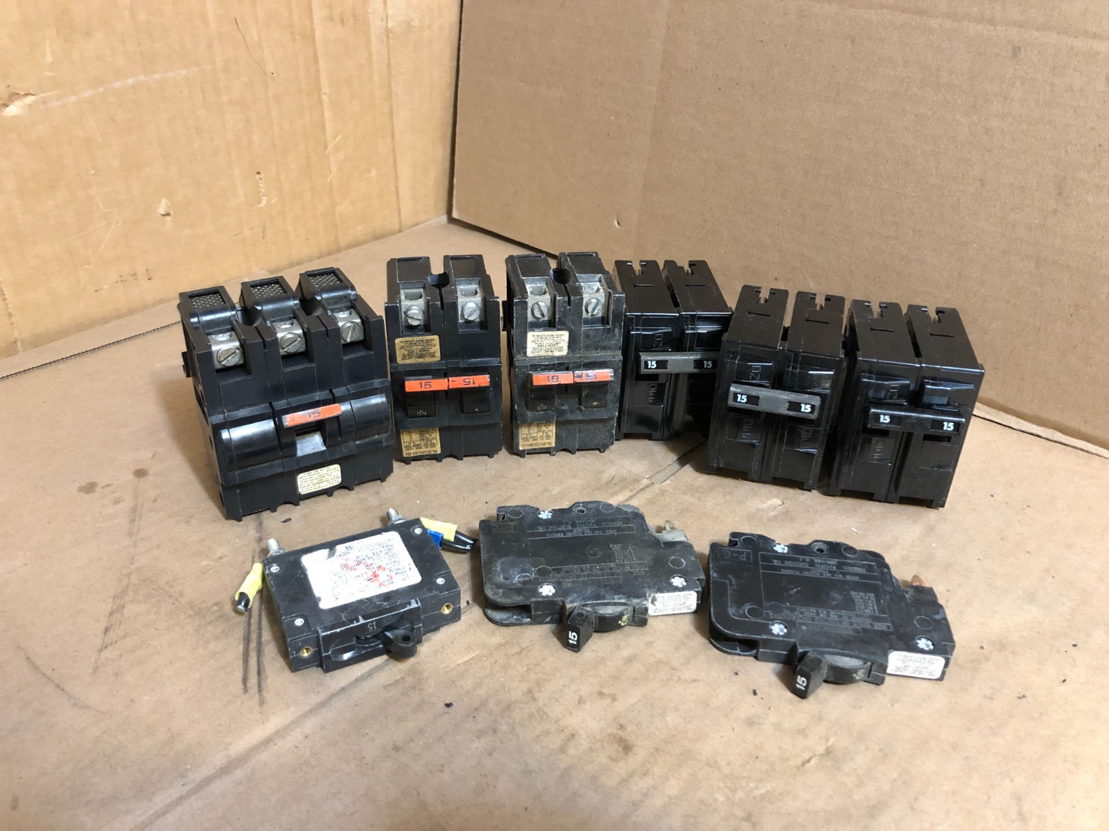 Mixed Lot of 9 15 Amps 120/240V 1 & 2 Pole Circuit Breakers