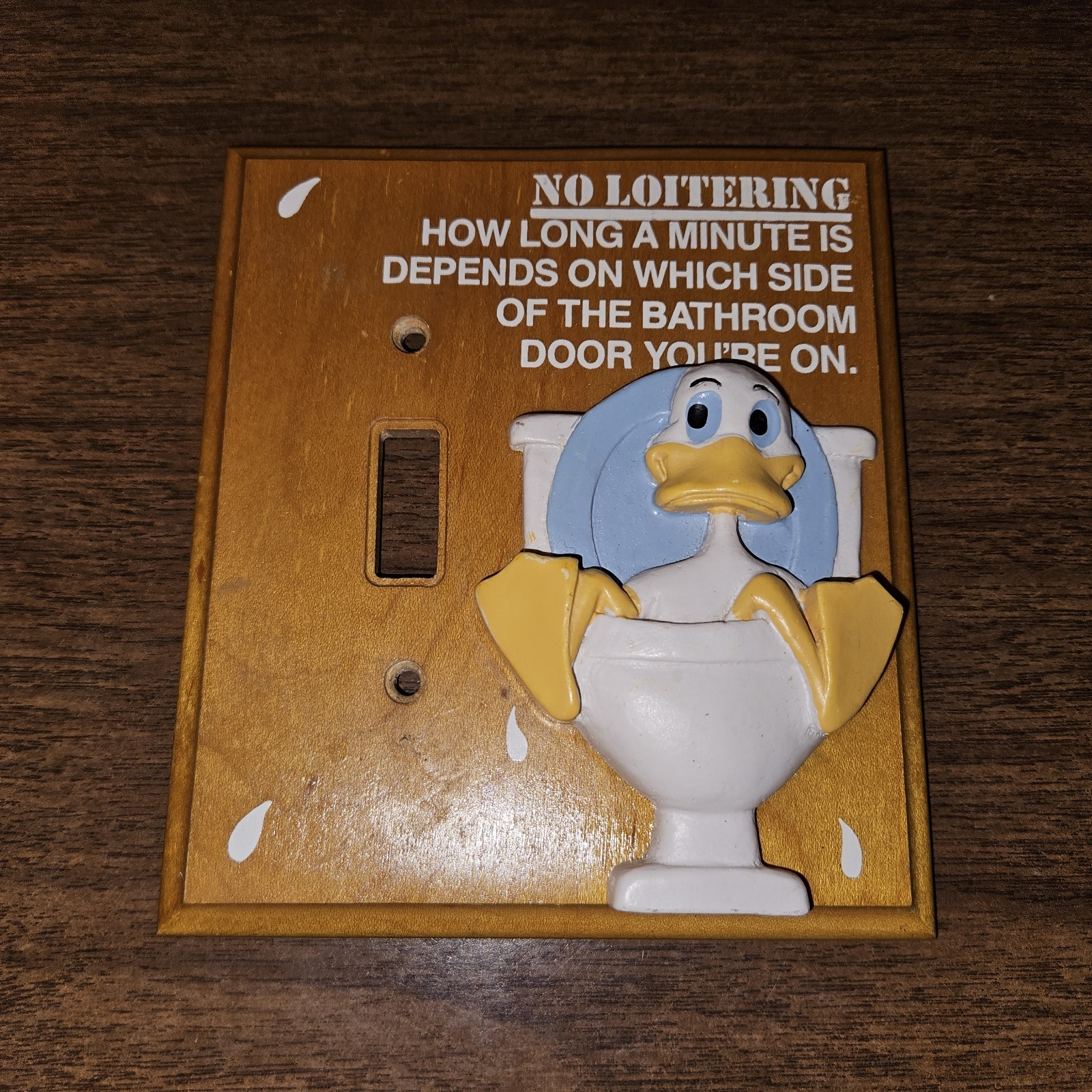 Bathroom Funny “How Long A Minute Is” Wood Wall Single Switchplate Cover – Duck