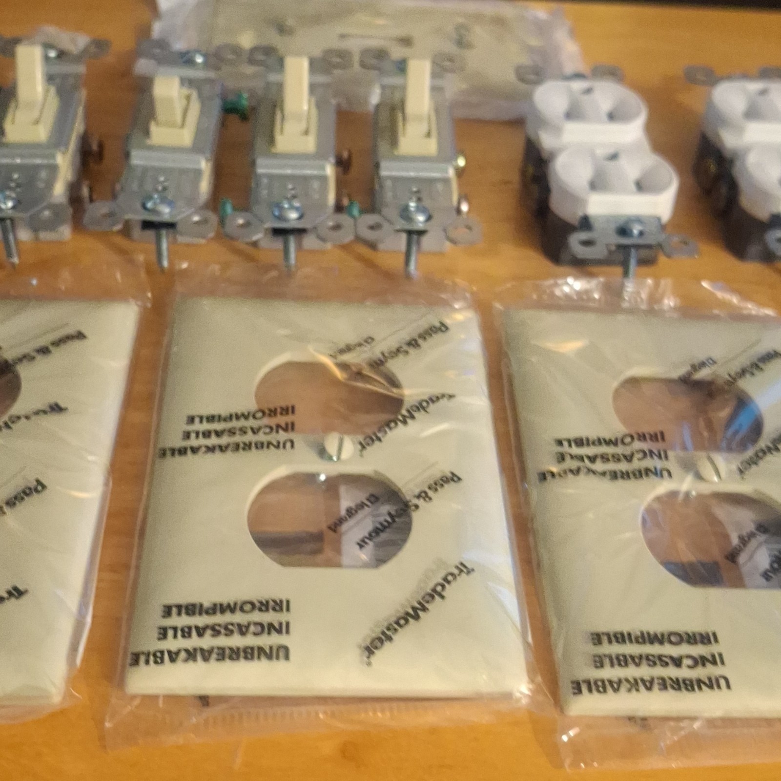 TradeMaster Ivory/White Toggle Switch, Duplex Outlets & Unbreakable Plates 15A