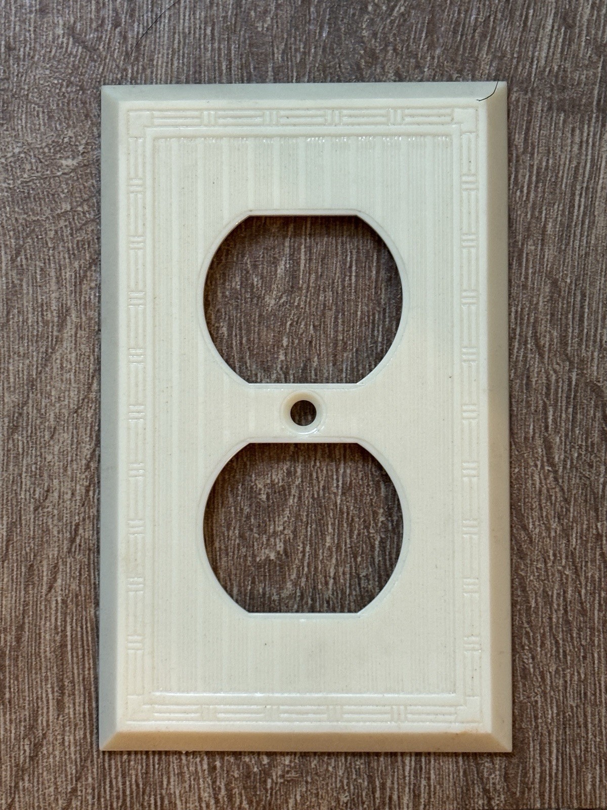 New Old Stock Art Deco Ribbed Cover Plate Ivory Outlet with Bamboo Border