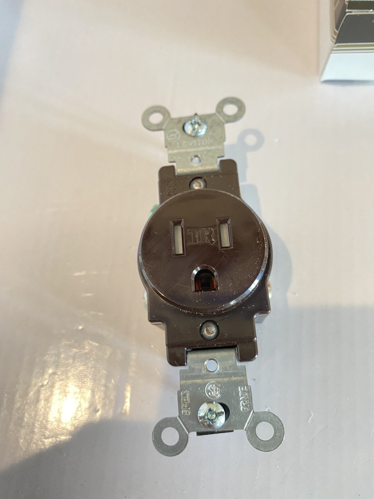 Leviton T5015 15A 125V Brown Thermoplastic Outlet 4.06 H x 1.38 W x 1.06 D in.