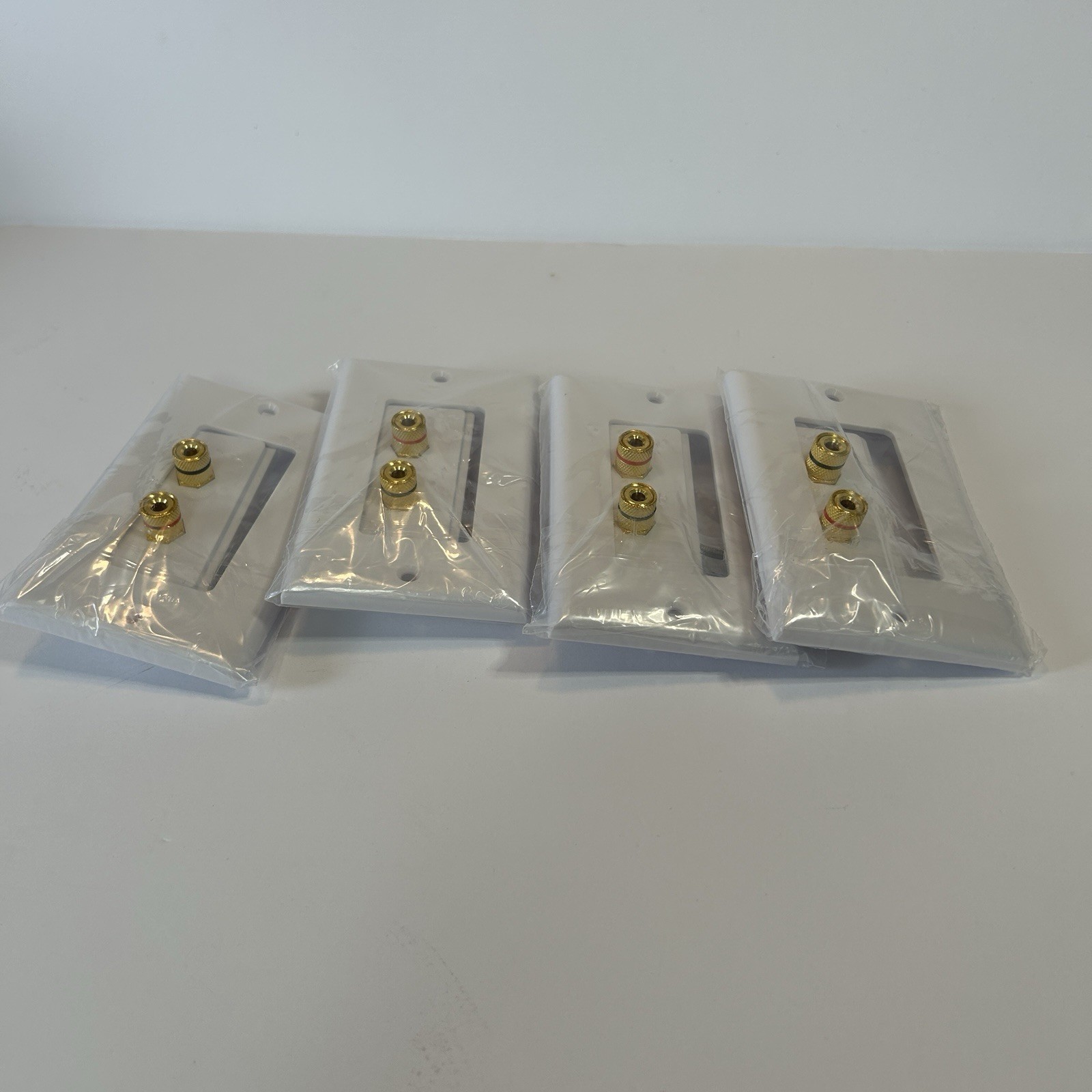 Lot of 4 White Glossy Wall Plates with 2 Gold Banana Connector Ports