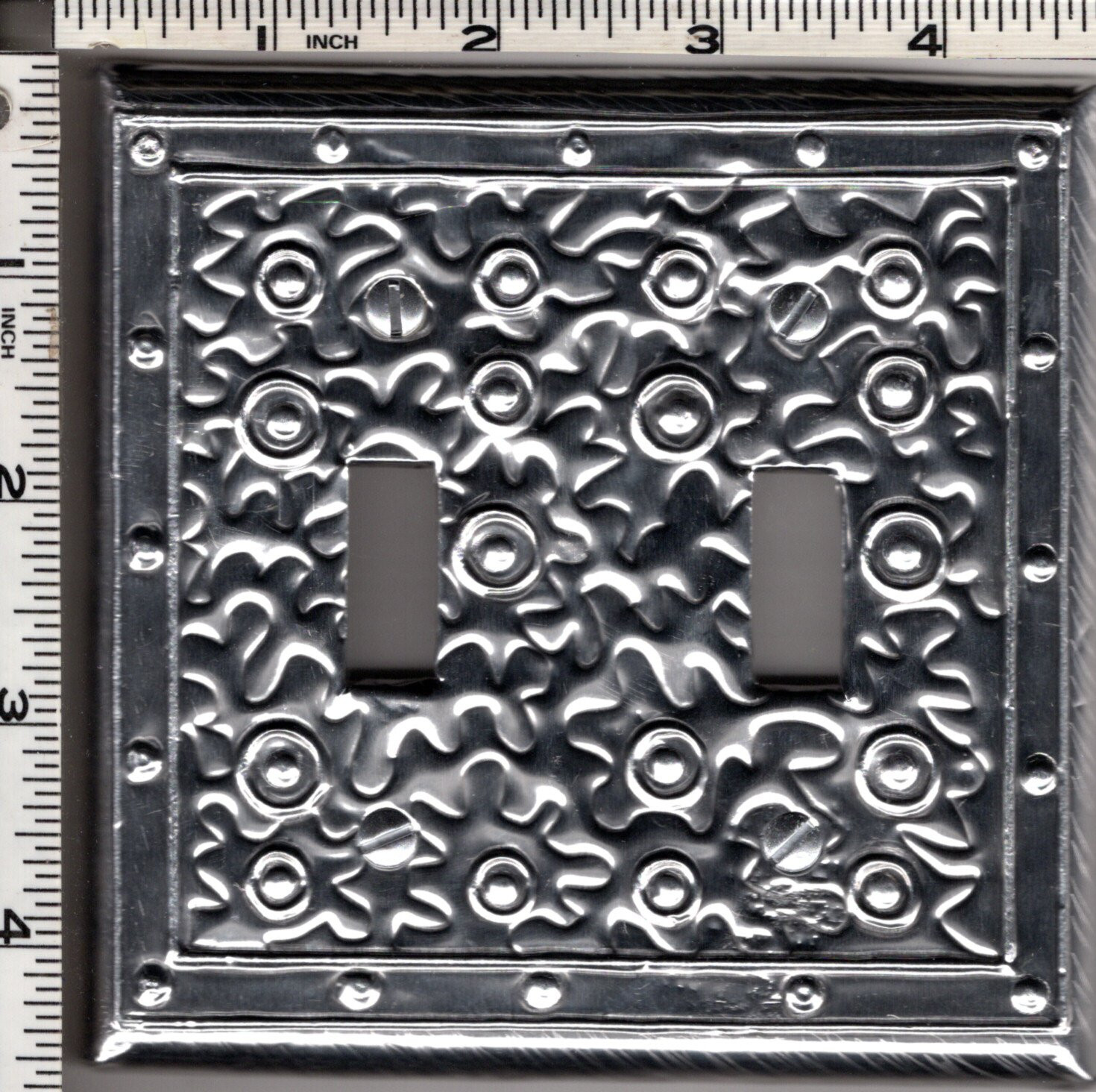 Aluminum Covered Plastic Double Toggle Wallplate by Metalyglass in Puerto Rico