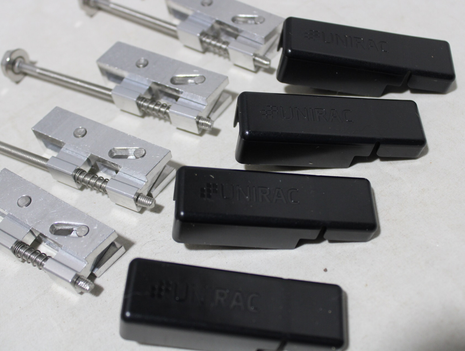 Lot of 4 packs Unirac SOLAR 302035M w/End clamp SM Pro cap 16 total NEW