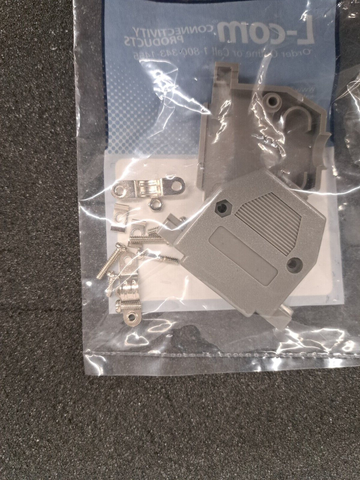 New, L-Com, SDC25G, D Sub Backshell, 180 Deg, Db, Plastic -Sold as a Lot of 7pcs