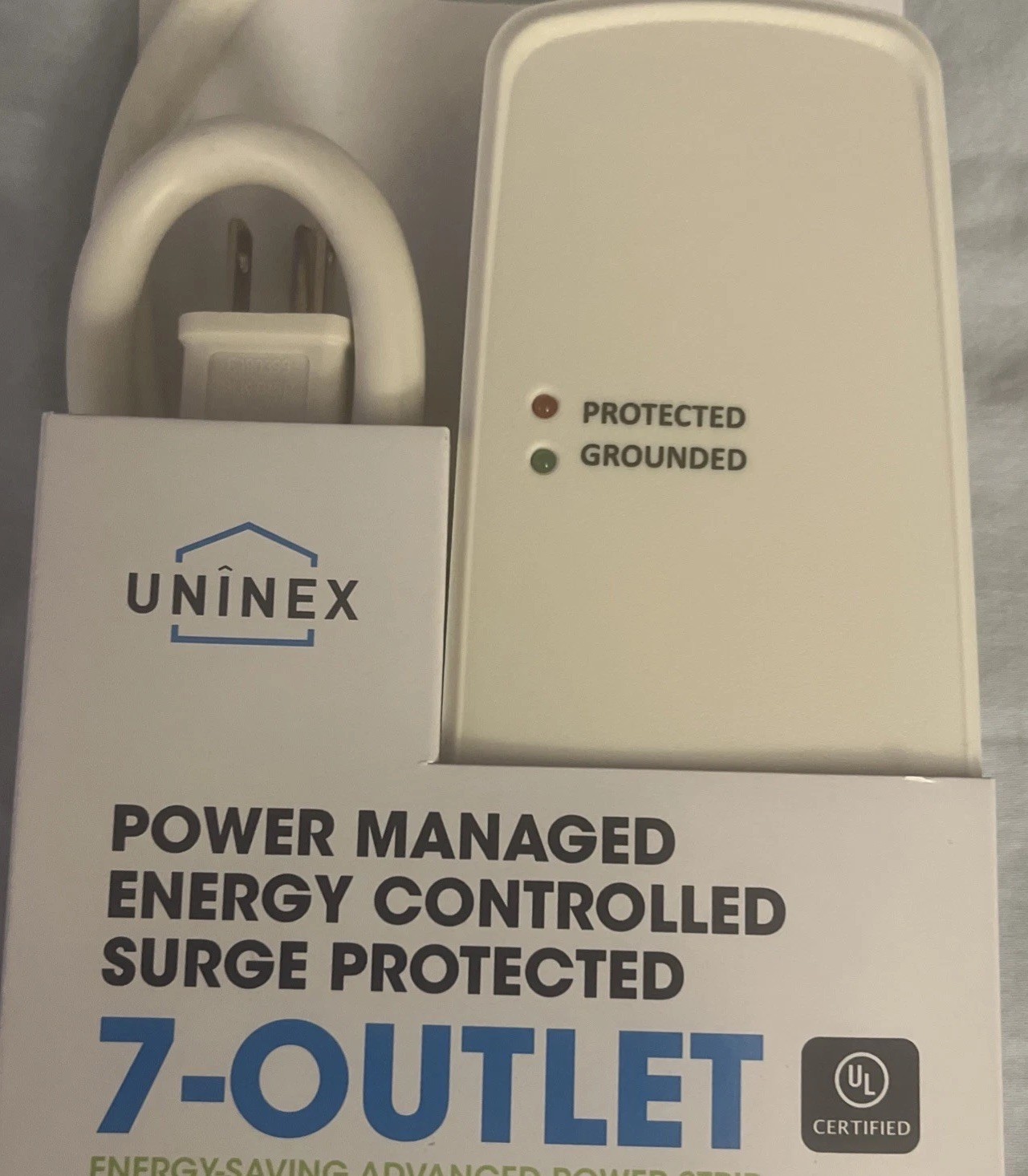 NEW -UNINEX POWER MANAGED ENERGY CONTROLLED SURGE PROTECTOR 7-OUTLET 1440 JOULES
