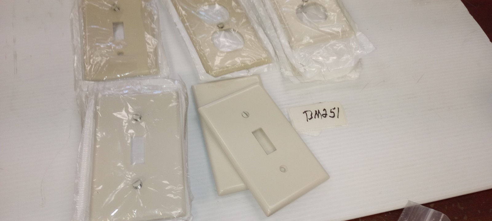 Leviton Almond Colored Elect Wall outlet cover ( LOT OF 11)