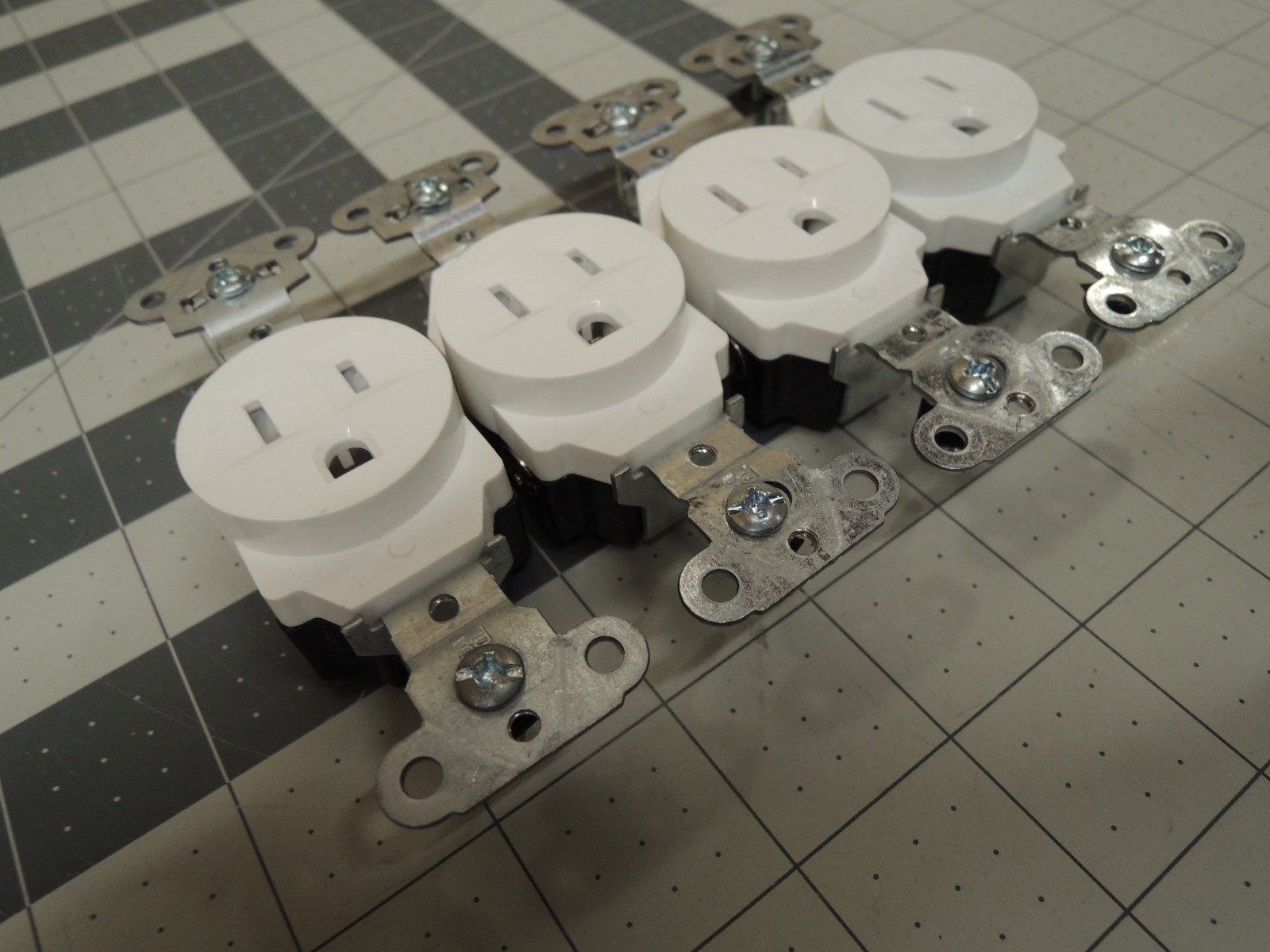 (4) Tamper-Resistant Construction Spec Grade Back & Side Wired Single Receptacle