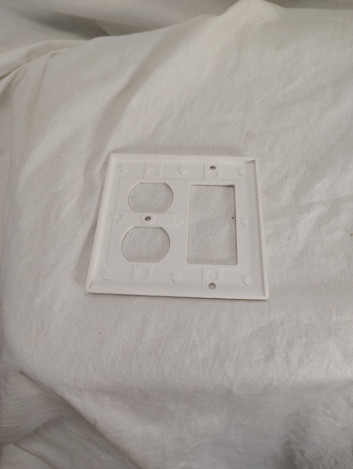 outlet cover, white, two plug, one switch size, measures 4.5×4.75 inches