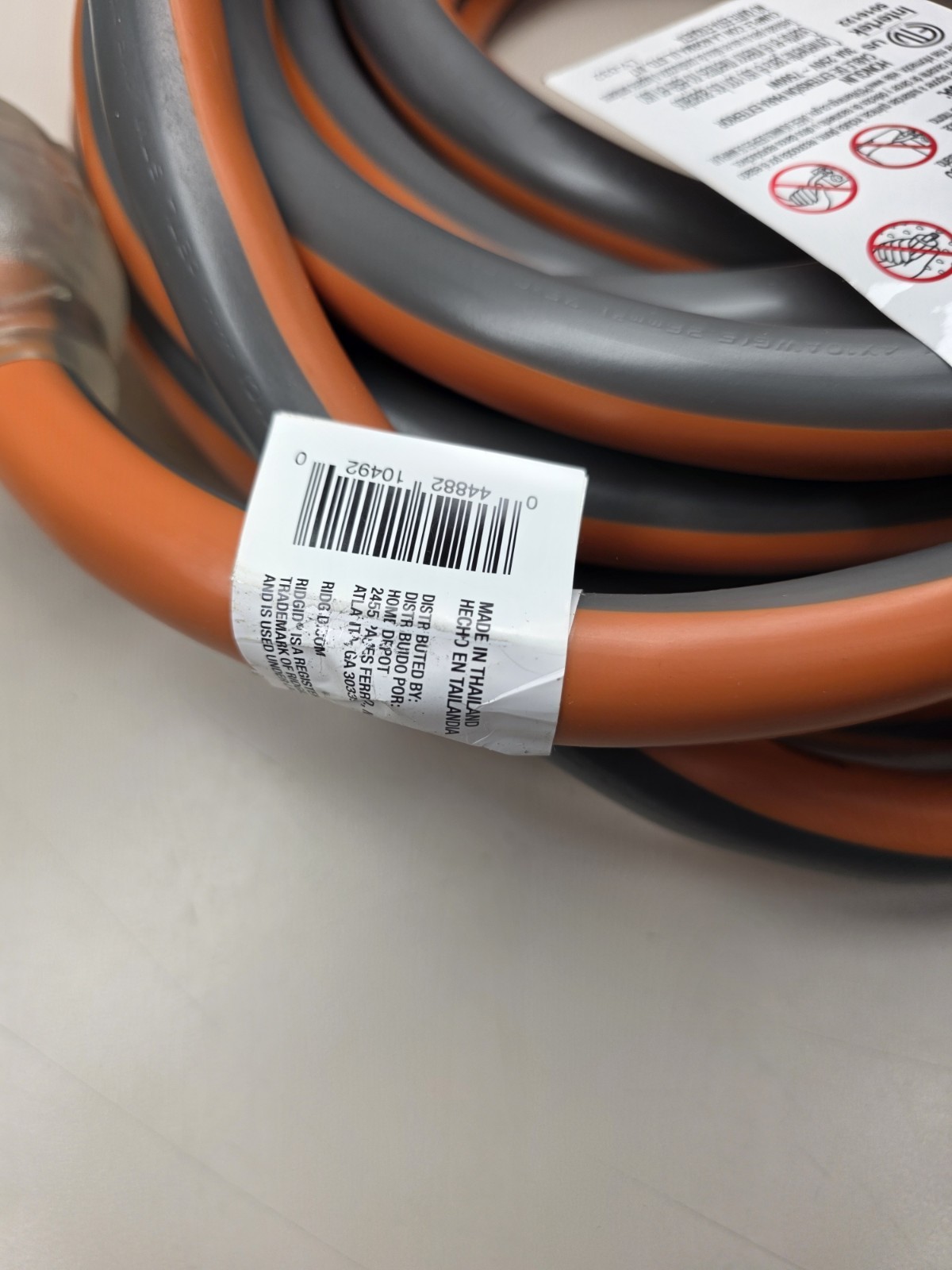 RIDGID 25′ 10/4 Heavy Duty Outdoor L14-30 Amp Generator Extension Cord, Orange