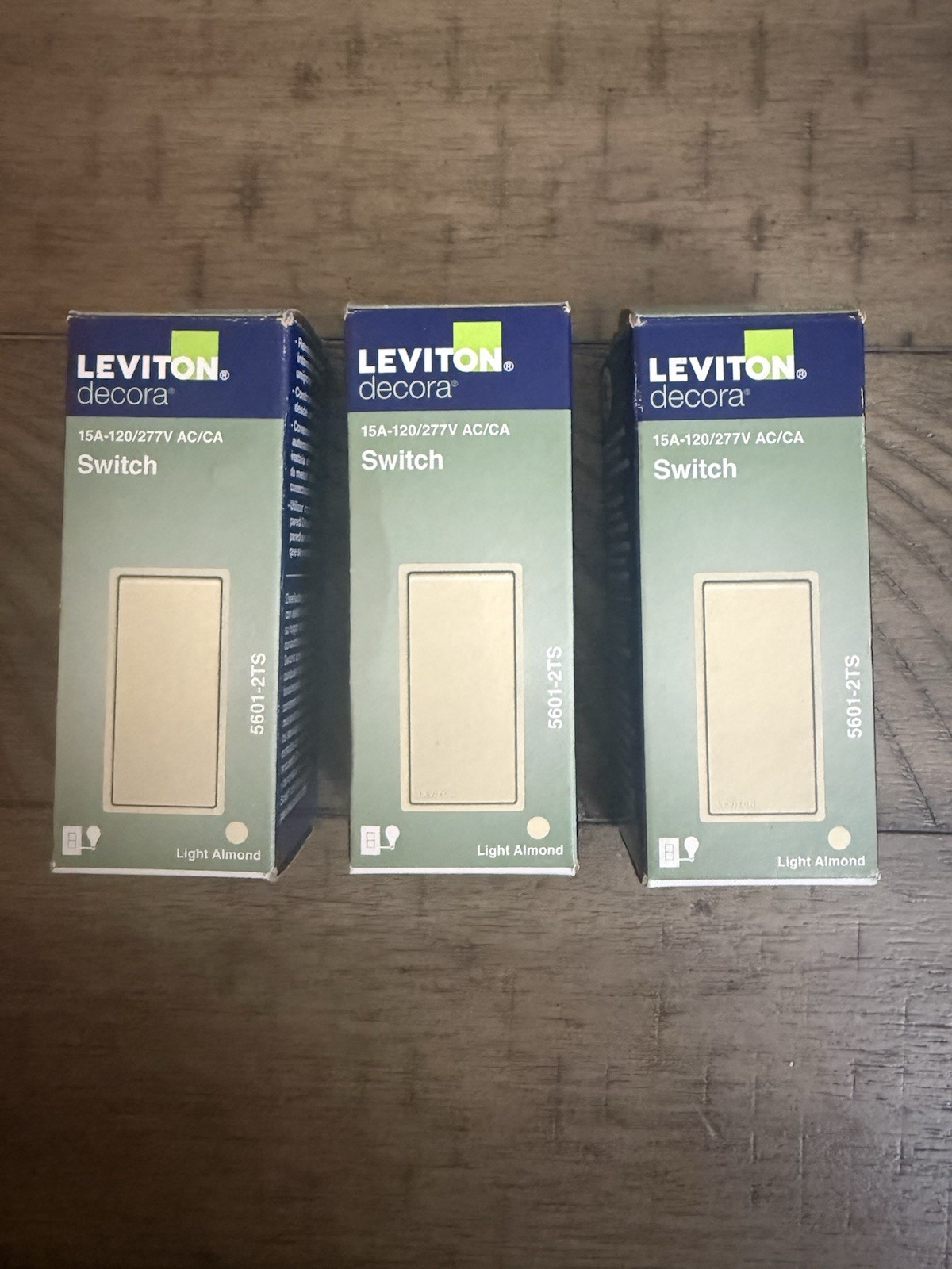 3 Leviton Decora 5601-2TS Rocker Switch in Light almond (15A 120/277V AC)