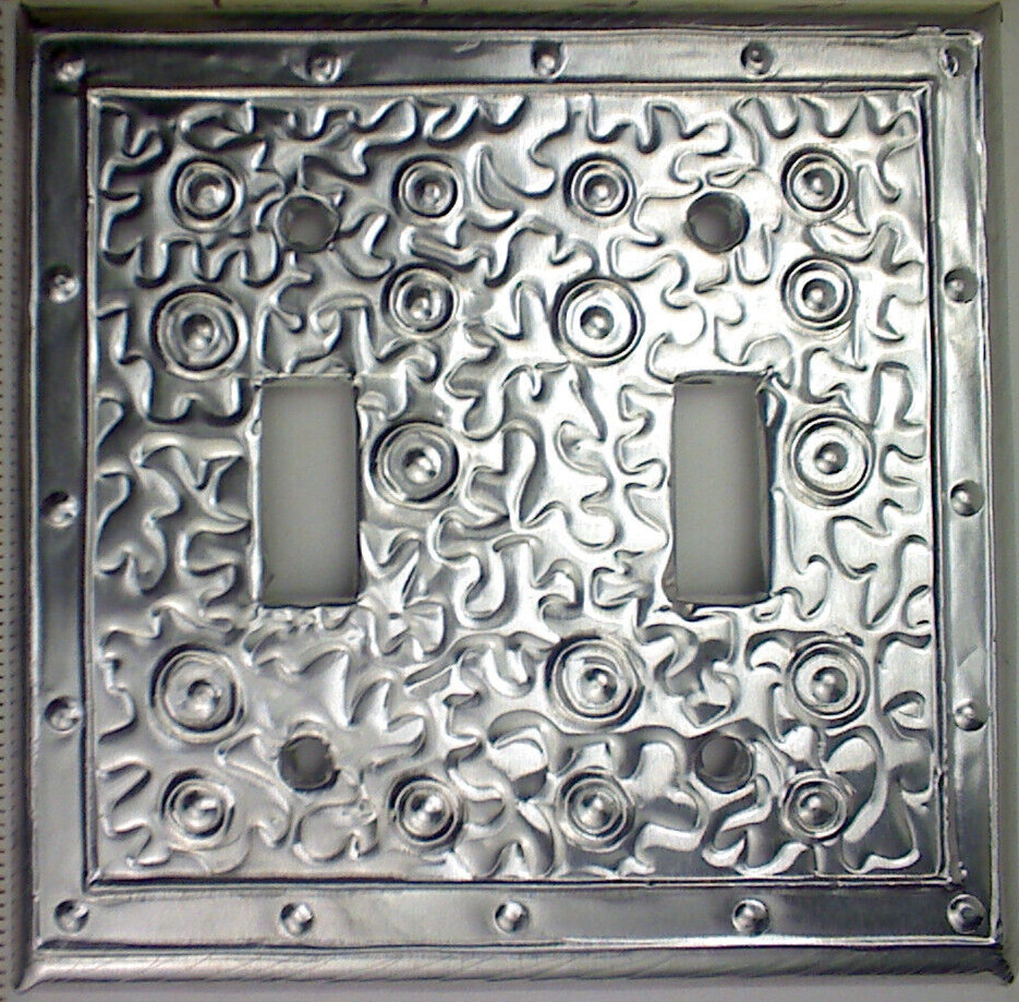 Aluminum Covered Plastic Double Toggle Wallplate by Metalyglass in Puerto Rico