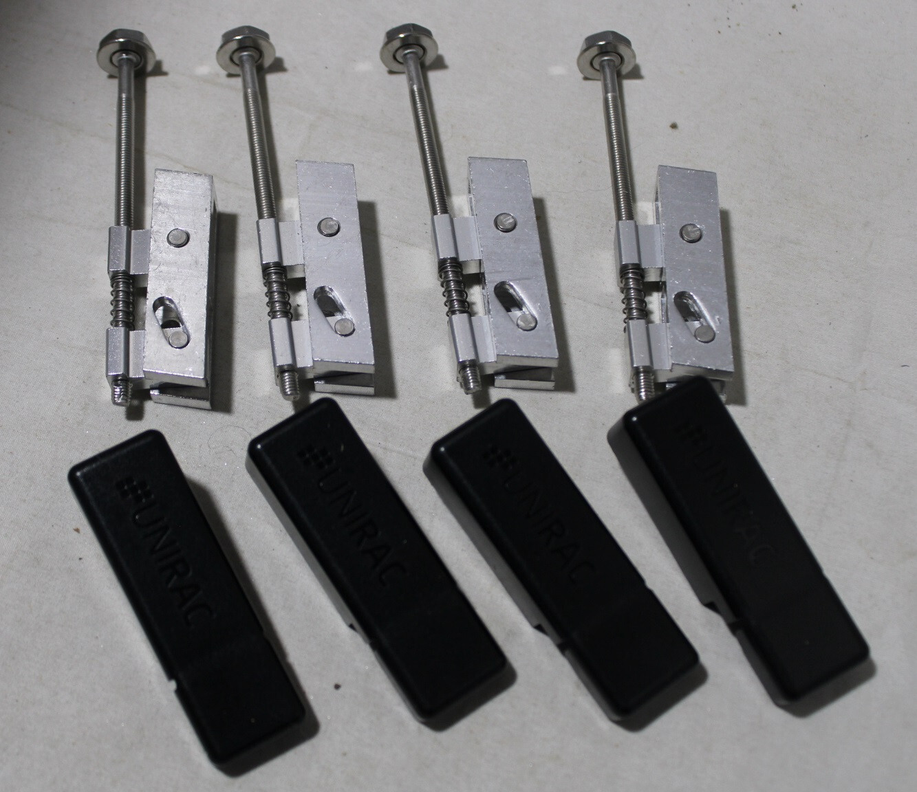 Lot of 4 packs Unirac SOLAR 302035M w/End clamp SM Pro cap 16 total NEW